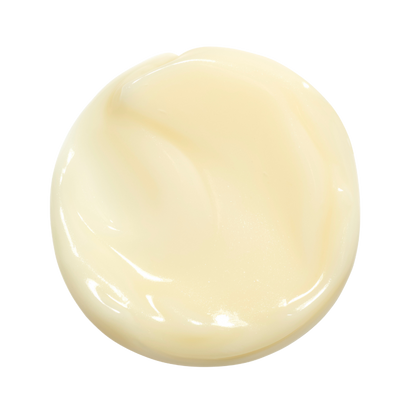 A circular blob of pale yellow cream